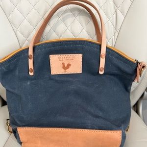 Meanwhile Back on the Farm blue medium backpack with strap included